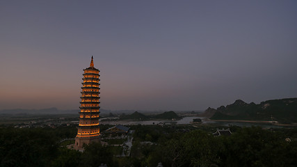 Image showing Bai Dinh Temple with illuminated tower in the dusk, Vietnam