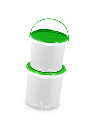 Image showing green paint in two buckets