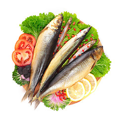 Image showing fish with lemon on plate