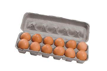 Image showing brown eggs in a carton package