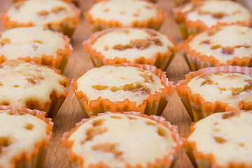 Image showing Close-up of freshly baked cakes with condensed milk