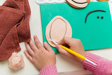 Image showing Children making christmas gingerbread