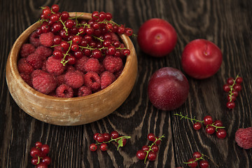 Image showing Fresh berries on wooden table