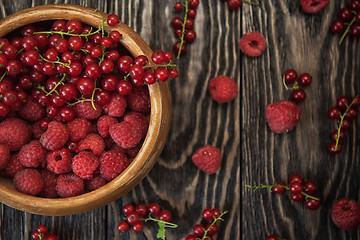 Image showing Fresh berries on wooden table