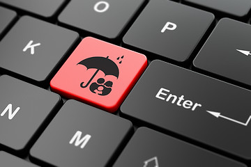 Image showing Security concept: Family And Umbrella on computer keyboard background