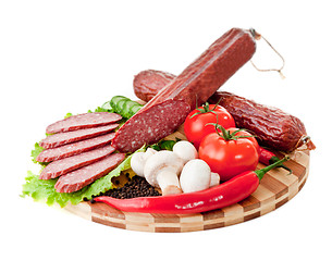 Image showing sliced sausage with vegetables and red papper