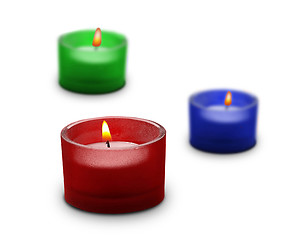 Image showing three candles isolated on white