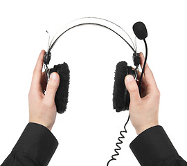 Image showing man holding nice headphones