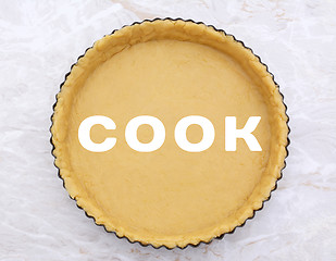 Image showing Flan tin lined with shortcrust pastry - COOK text