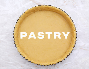 Image showing Flan tin lined with shortcrust pastry - PASTRY text