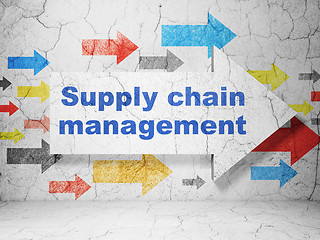 Image showing Advertising concept: arrow with Supply Chain Management on grunge wall background