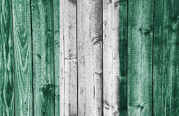 Image showing Flag on weathered wood