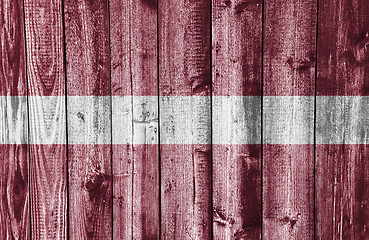 Image showing Flag on weathered wood