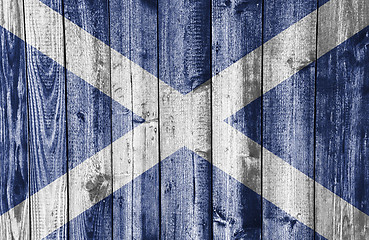 Image showing Flag on weathered wood