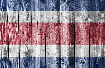Image showing Flag on weathered wood