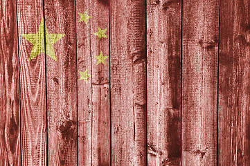 Image showing Flag on weathered wood