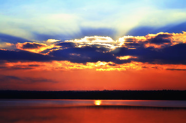 Image showing Sunrise over the lake early in the morning with beautiful clouds