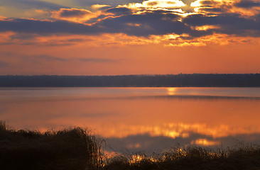 Image showing Sunrise over the lake early in the morning with beautiful clouds