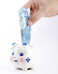 Image showing hand euro with piggy bank