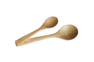 Image showing New wooden spoon isolated on a white background.