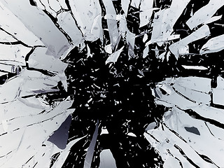 Image showing Pieces of Broken Shattered black glass isolated on black