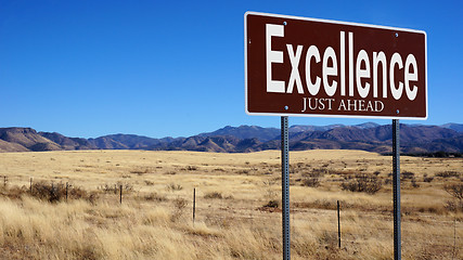 Image showing Excellence Just Ahead brown road sign