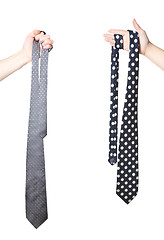 Image showing two hand holding tie\'s
