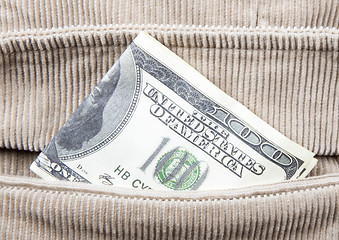 Image showing Close-up of hundred dollar bill in pocket