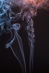 Image showing Beautiful smoke on the black background - macro photo