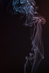 Image showing Beautiful smoke on the black background - macro photo