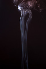 Image showing Beautiful smoke on the black background - macro photo