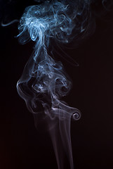 Image showing Beautiful smoke on the black background - macro photo