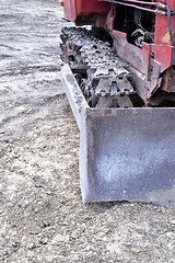 Image showing Old caterpillar bulldozer working on construction site