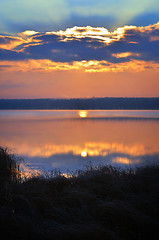 Image showing Sunrise over the lake early in the morning with beautiful clouds