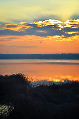 Image showing Sunrise over the lake early in the morning with beautiful clouds