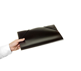 Image showing hand holding a folder