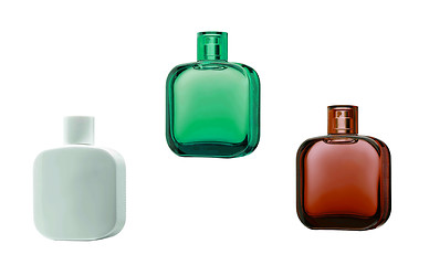 Image showing three perfume bottles with reflections