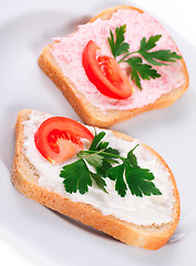 Image showing toast with tomato and fish caviar cream