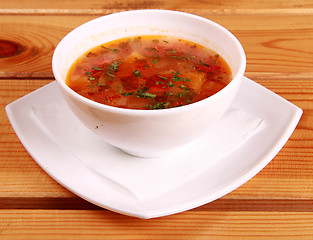 Image showing Bowl of Bright Red Creamy Tomato Soup with Yogurt