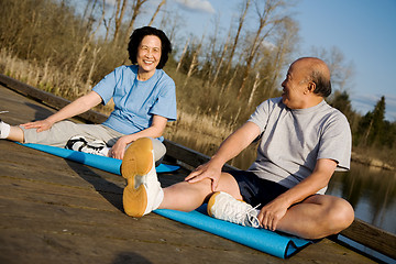 Image showing Asian senior couple exercise