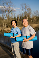 Image showing Senior asian couple exercise