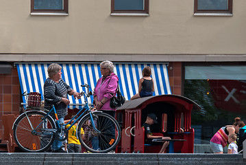 Image showing The street conversation.