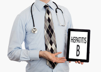 Image showing Doctor holding tablet - Hepatitis B