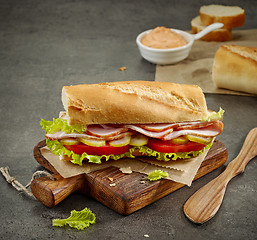 Image showing sandwich with smoked meat and vegetables