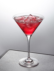 Image showing glass of red iced cocktail