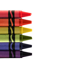 Image showing six used colored vax crayons form rainbow