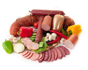 Image showing sliced sausages with vegetables and red papper