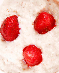 Image showing Fresh strawberries in porridge