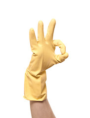 Image showing hands in yellow gloves isolated on white