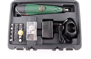 Image showing Battery drill in a case isolated